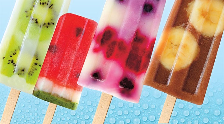 Image of four different fruit popsicles with real fruit